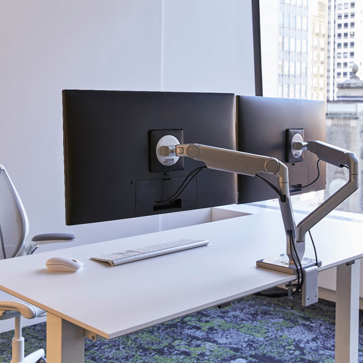 How to properly use a flat-screen monitor arm at the office